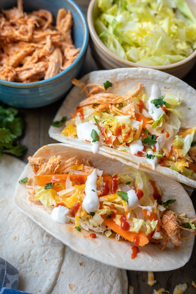 Buffalo Chicken next to ranch coleslaw for Chicken tacos