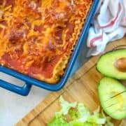 Taco Lasgana: Your favorite taco dip turned into a hearty lasagna ready to be topped with all your favorite Tex-Mex toppings.