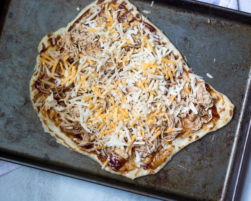 Pulled Pork on grilled pizza dough