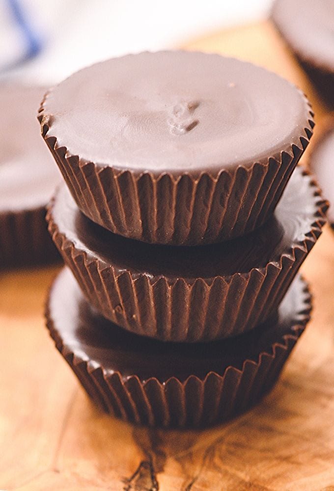4 healthy peanut butter cups stacked on top of eachother.