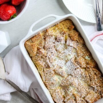Eggnog French Toast Casserole in white baking dish.