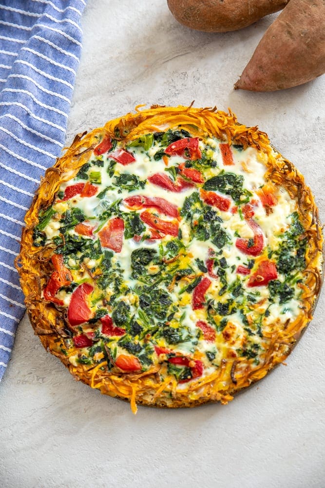 Baked Quiche with Sweet Potato Crust on white counter
