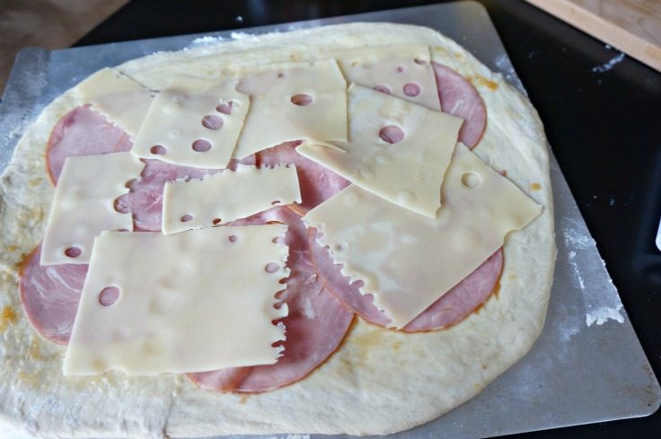 Ham and cheese on bread dough