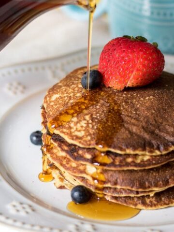 These pancakes are made gluten free with oats and are kept super light and fluffy with the addition of cottage cheese--which also boosts the protein in these pancakes, for a perfect start to your day.