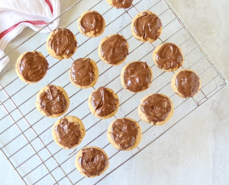 Chocolate Dipped Peanut Butter Cookies on Baking Rack.