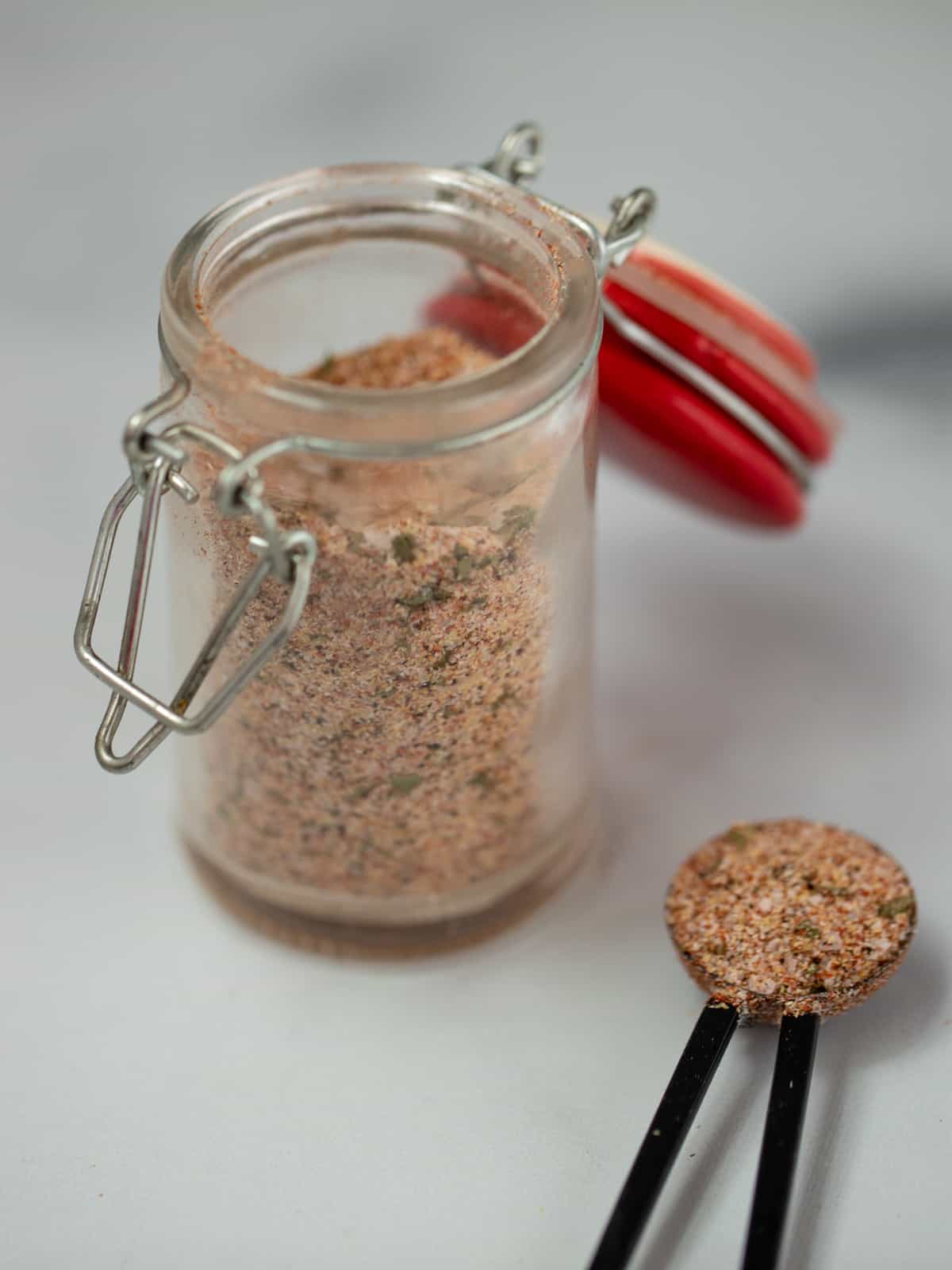 Spice jard filled with seasoned salt blend. 