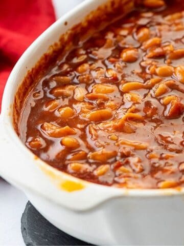 Baked Beans in white casserole dish