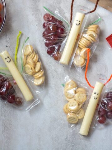 3 DIY butterfly snack baggies on white counter