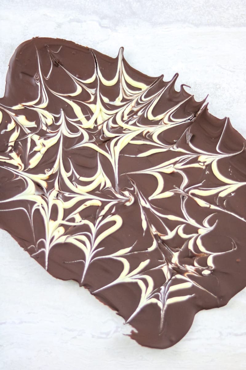 Marbled Chocolate Bark on white counter.
