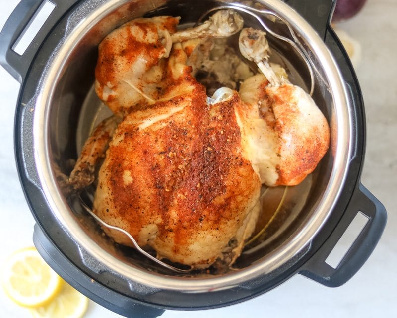 Whole chicken cooked in pressure cooker with rotisserie seasoning.