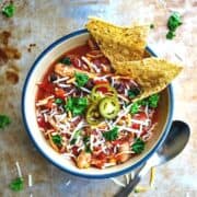 Bowl of Crock Pot Chicken Chili topped with cheese