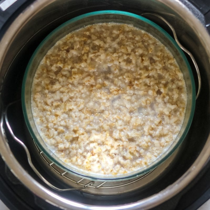 perfectly cooked oats in a glass bowl in the instant pot