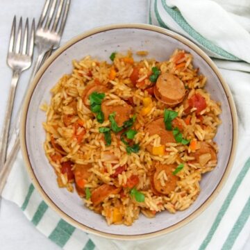 Bowl of Instant Pot Jambalaya topped with parsley