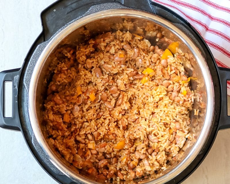 Instant pot filled with brown rice with salsa and beans