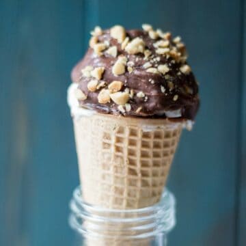 Close up of one Homemade Drumstick Ice Cream Cone covered in chocolate
