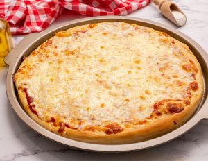 Baked Cheese pizza made with whole white wheat pizza dough.
