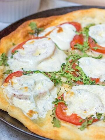 Fresh Tomato Pizza on baking sheet