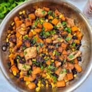 Skillet with Sweet Potatoes, Black Beans, and Chicken.