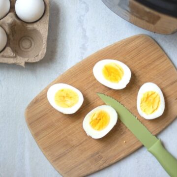 Perfect Hard Boiled Eggs Sliced Open on cutting board