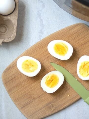 Perfect Hard Boiled Eggs Sliced Open on cutting board