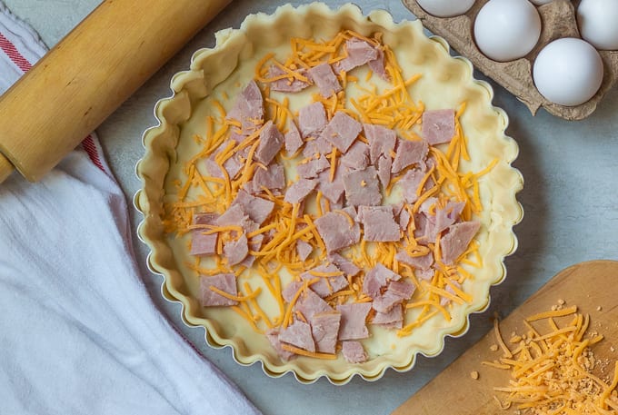 cubed ham and shredded cheddar cheese in pie crust. 