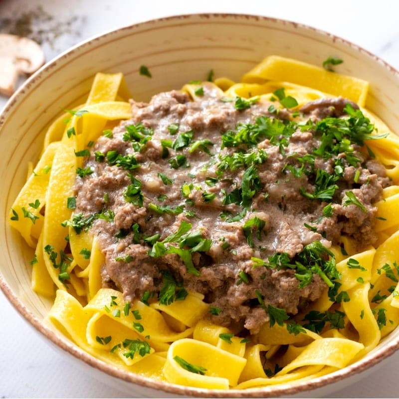 Beef Stroganoff in a large decorative bowl