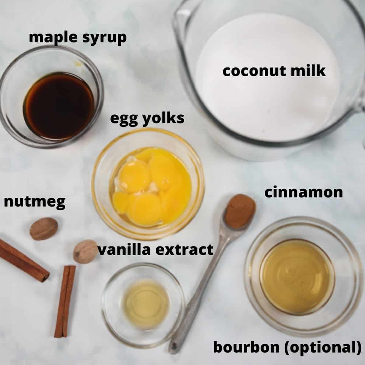 Ingredients for coconut milk eggnog labled on counter