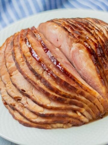 Instant Pot Honey Baked Ham on white plate