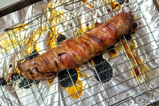 Oven Roasted Pork Tenderloin wrapped in baconon Baking Sheet.