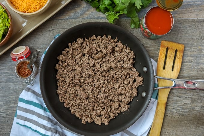 Skillet with ground beef browned and broken up