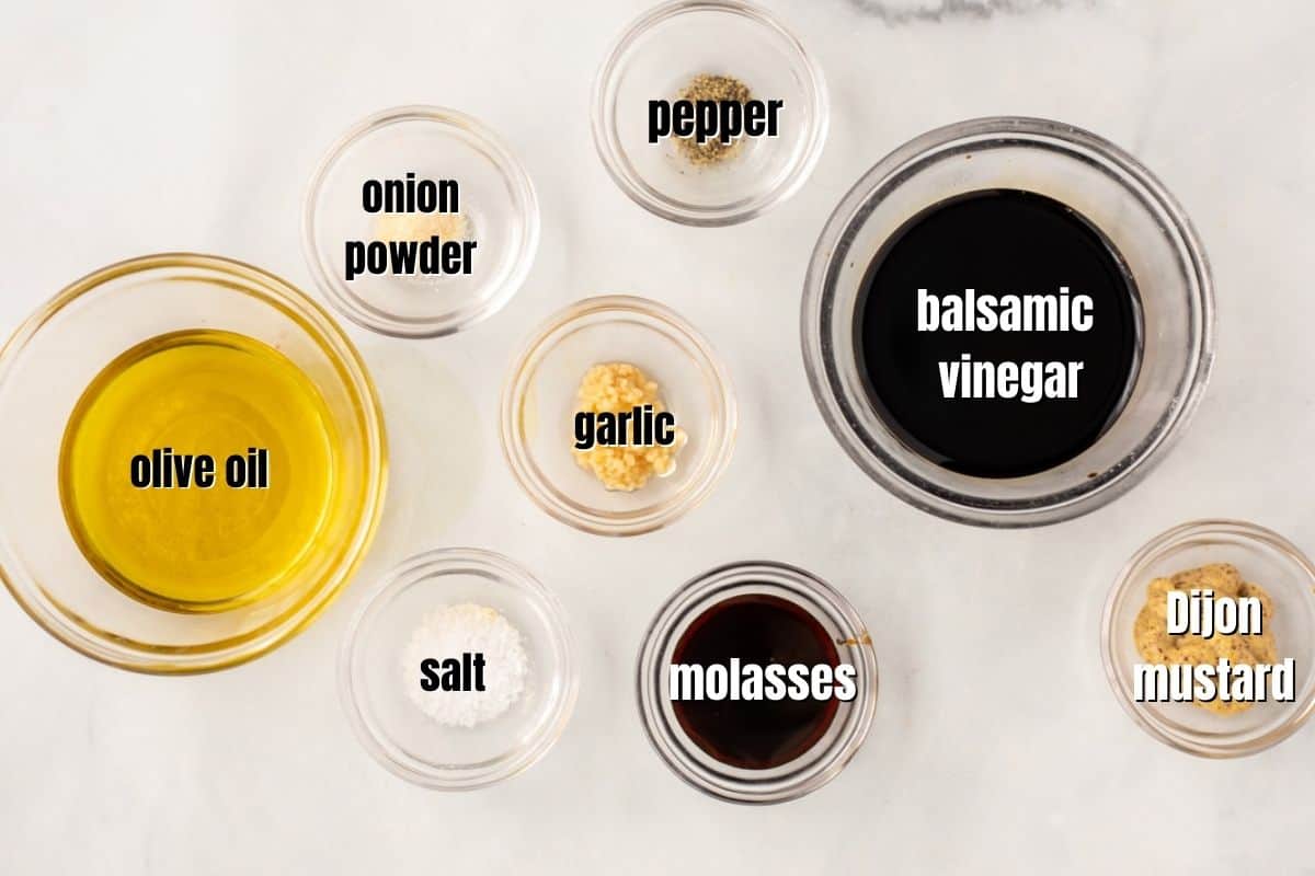 Ingredients for Balsamic Dressing labled on counter. 