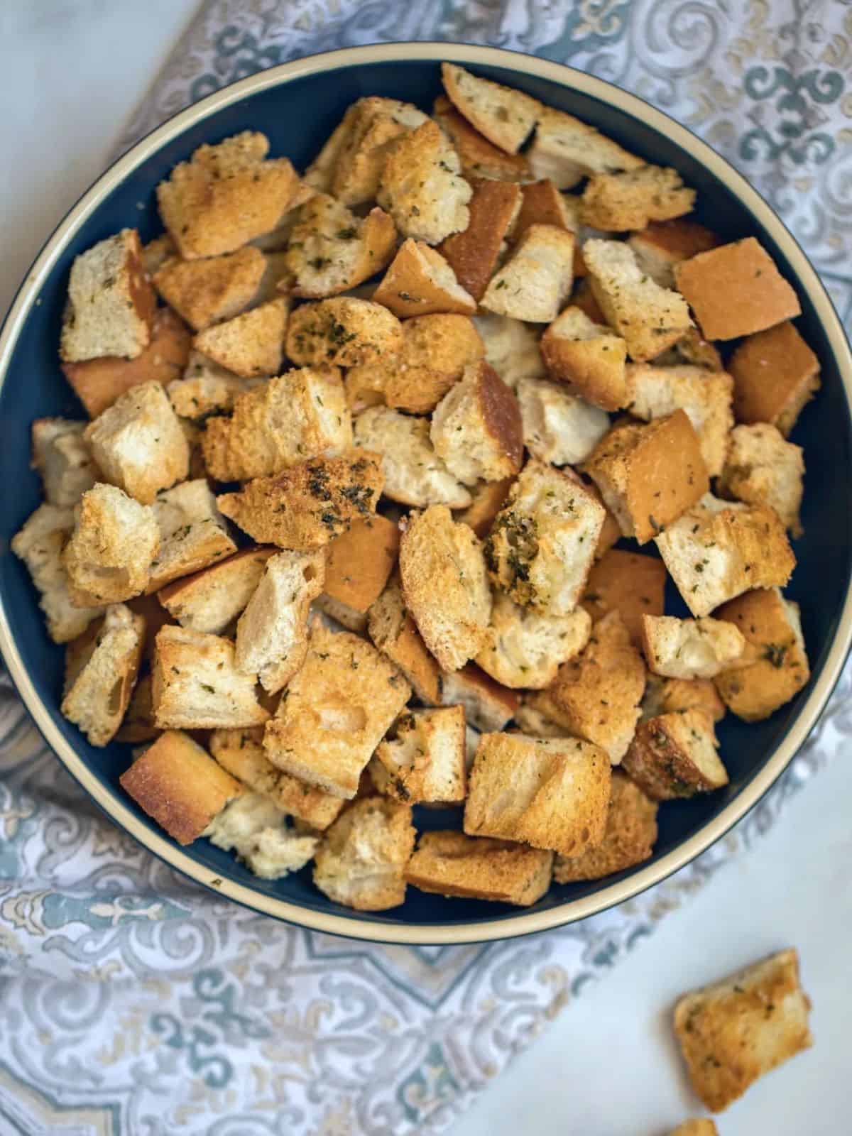 Bowl of Homemade Croutons on counter.