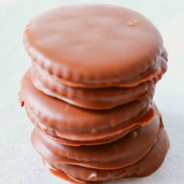 Stack of trhee thin mints on counter.