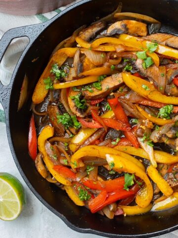 Skillet with peppers, onions, and portabellos