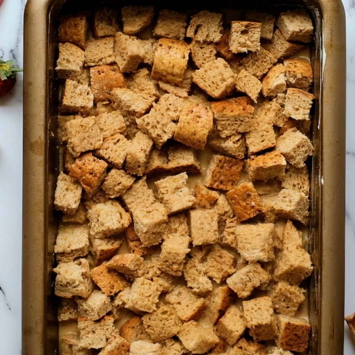 Assembled French Toast Casserole in baking dish.