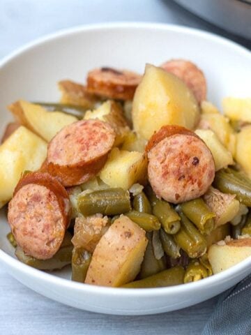 Kielbasa, Potatoes, and Green Beans in white bowl