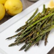 Asparagus on White Platter with parmesan
