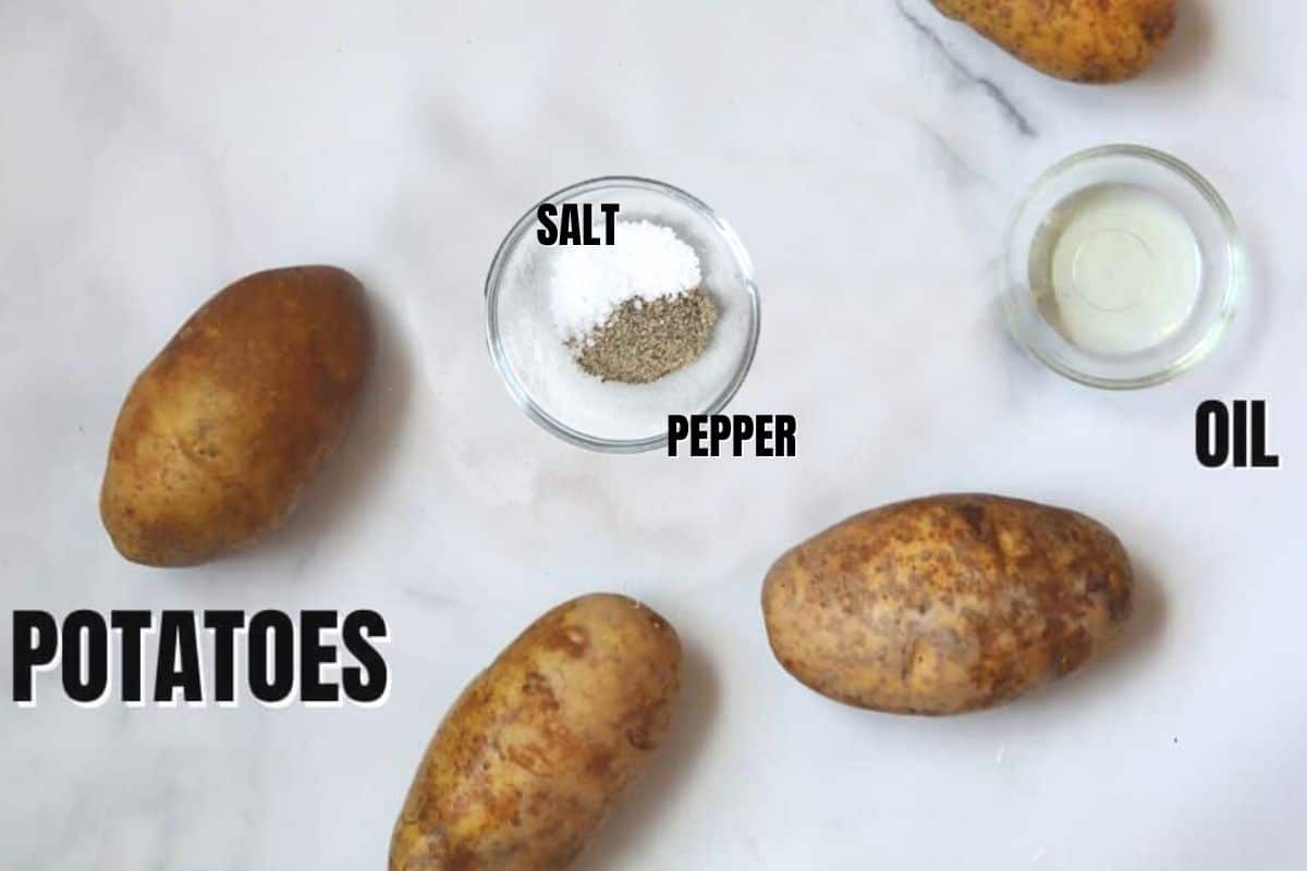 Potaotes, oil and salt and pepper on counter labeled.