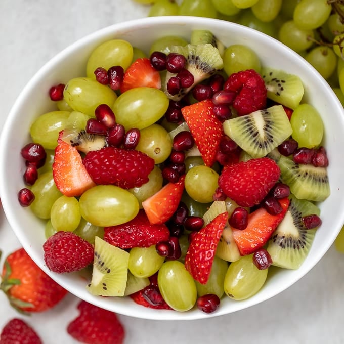 Bowl of red and green fruit salad