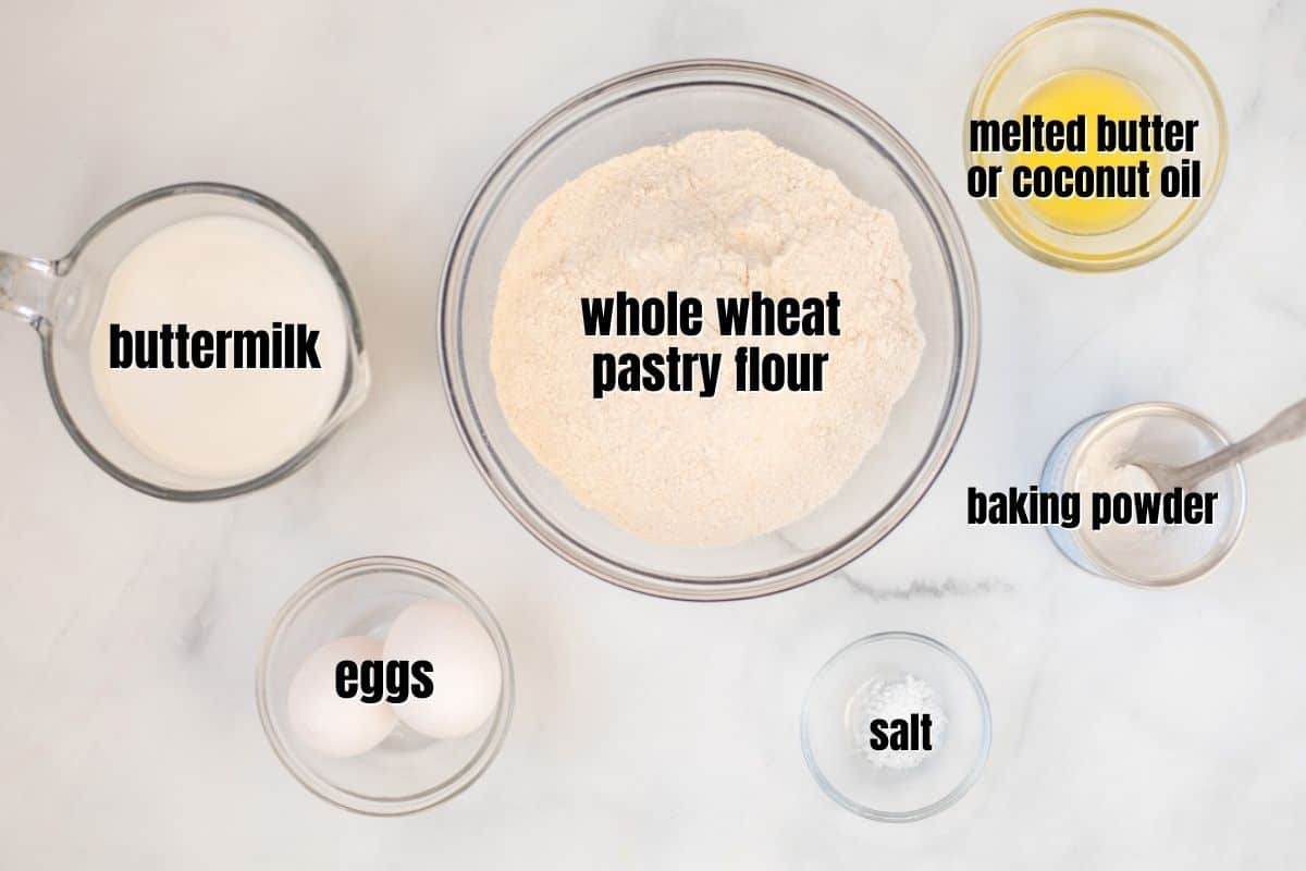 Ingredients for whole wheat pancakes labled on counter. 