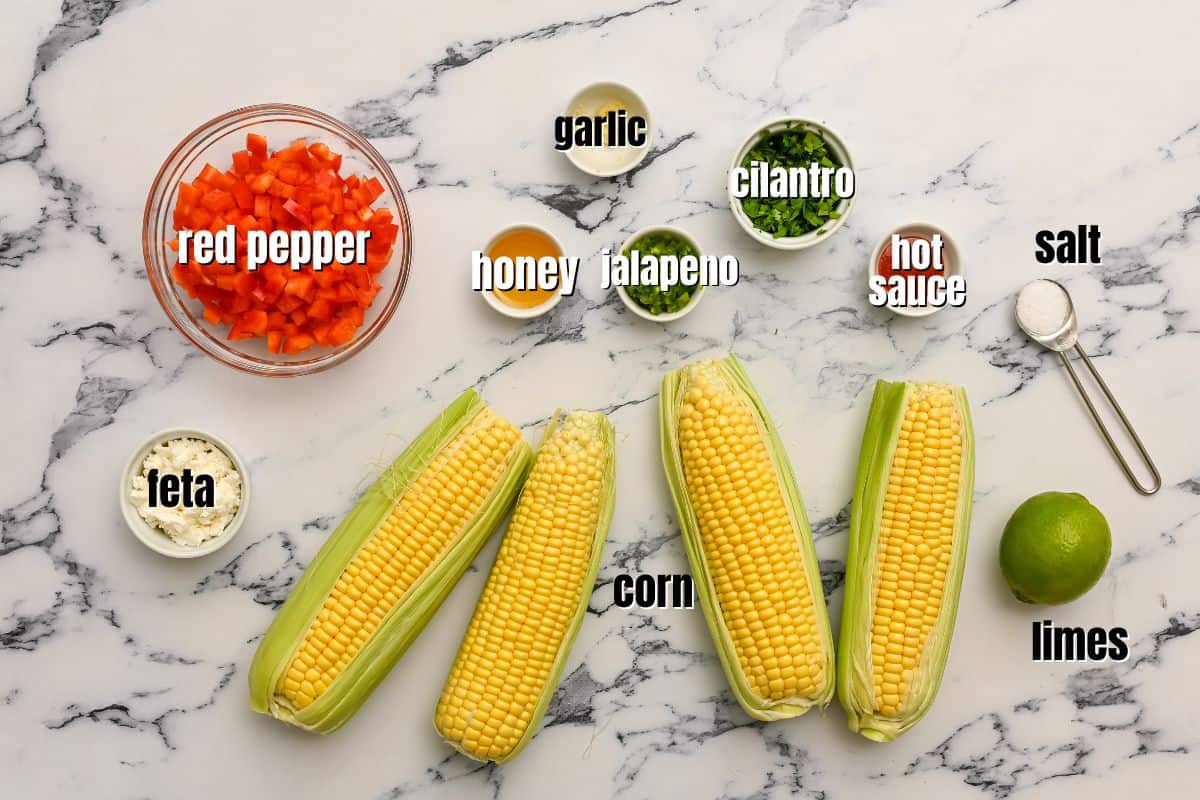 Ingredients for corn salsa labeled on counter.