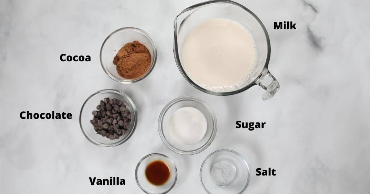 Ingredients for Hot Chocolate on white counter labeled. 