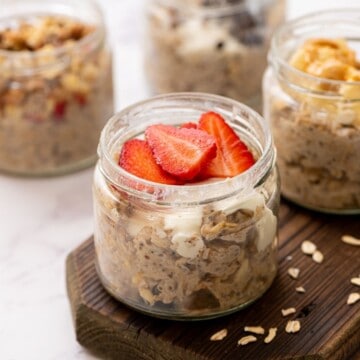 Jar of overnight oats with strawberries.