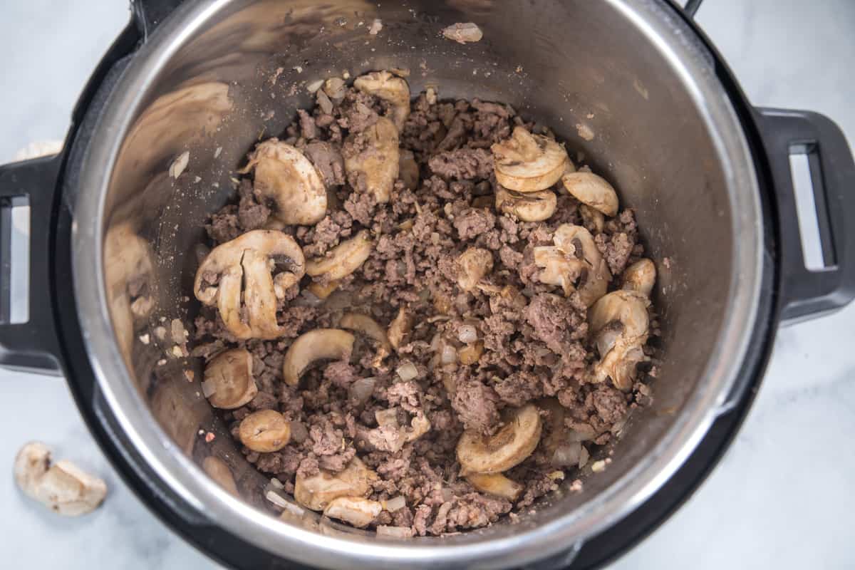 Mushrooms and ground beef sauteed in instant pot. 