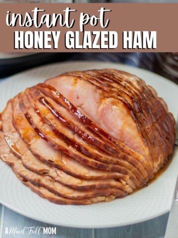 Sliced glazed ham on white tray with title text overlay.