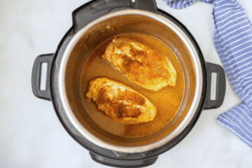 Cooked seasoned chicken inside the instant Pot.