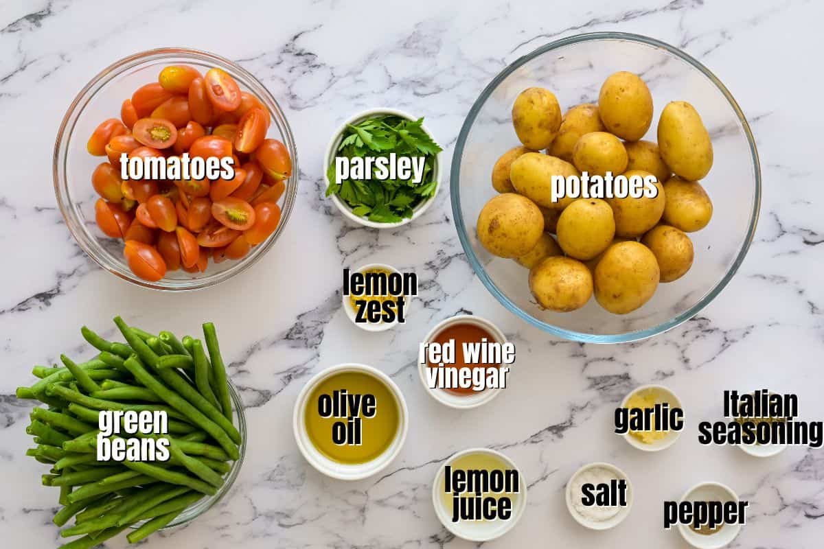 Ingredients for Italian potato salad labeled on counter.