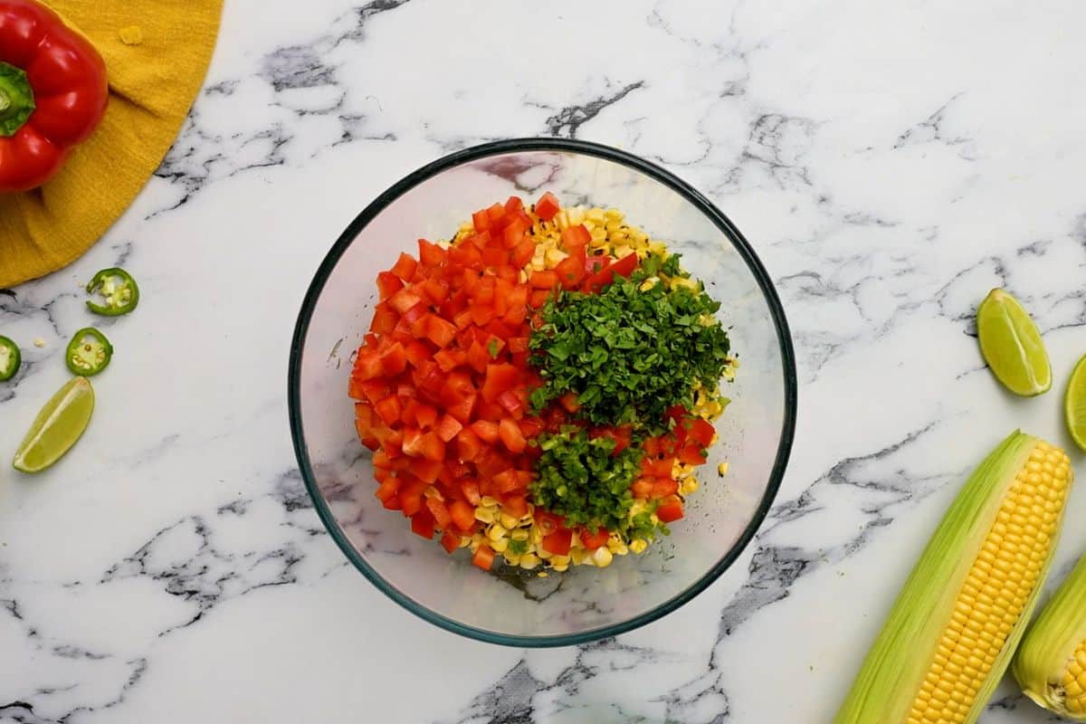 Corn, peppers, cilantro, and jalapeno with lime zest.