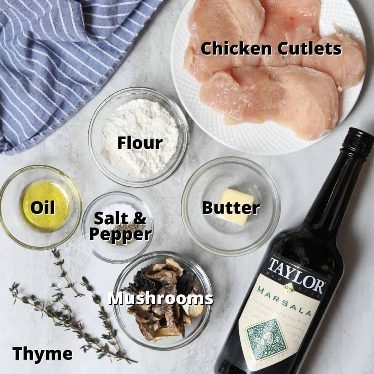 Ingredients for chicken marsala labeled on counter.