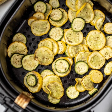 Air Fried Squash and Zucchini in basket of air fryer.